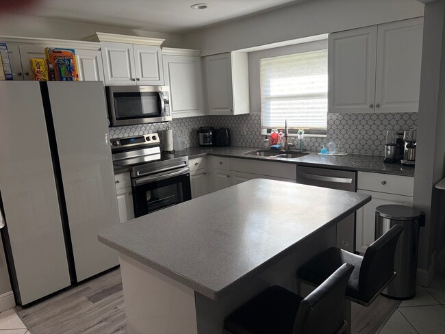 Kitchen is three years old - 9521 Boca Cove Cir Unit 505