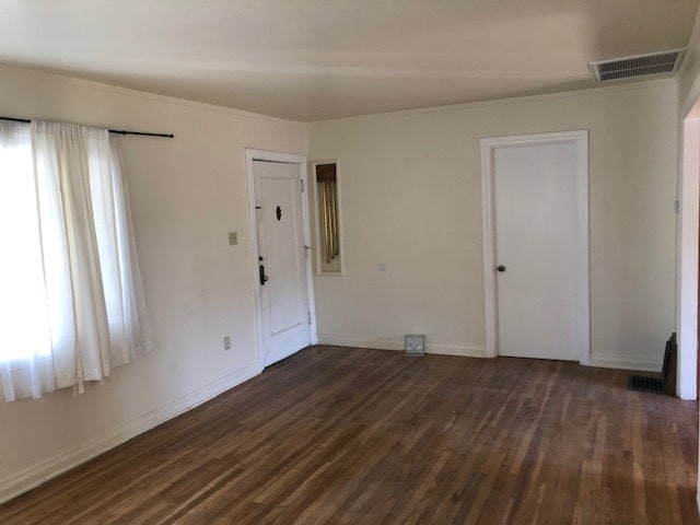 Living room looking toward front door on left, 2nd BR door on right. - 10516 Blythe Ave