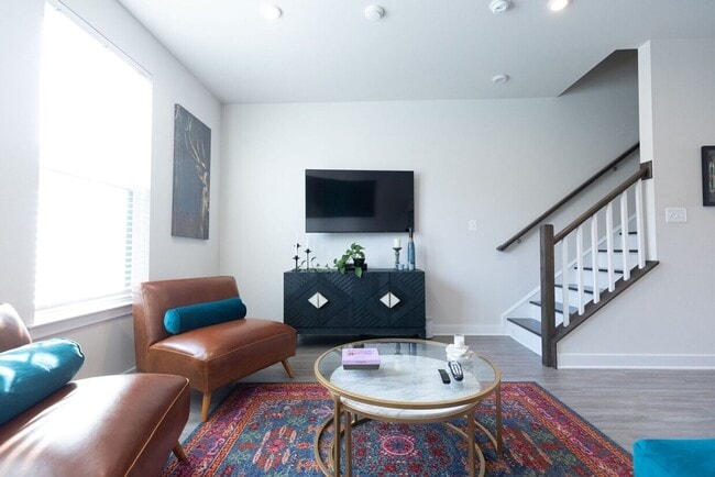 Building Photo - Available Now! Discover urban living at its finest in this 4-level gem!