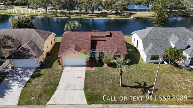 Photo - 704 49th St E