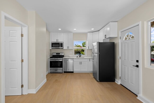Building Photo - Brand New 1BR/1BA Home Near SDSU – Designer Kitchen, In-Unit Laundry, Private Patio, and Modern F...