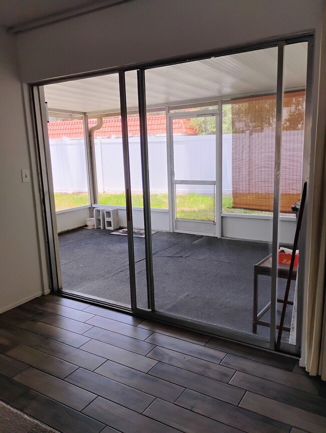 Screened lanai back door utility rm here - 2831 Swifton Dr Unit Swifton Villas 15