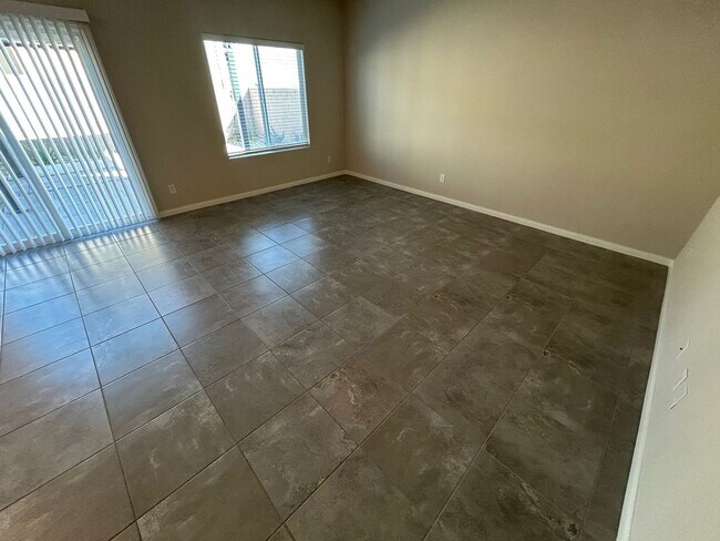 Photo - Gorgeous two-story home with 5 bedrooms and 3 bathrooms in a gated community