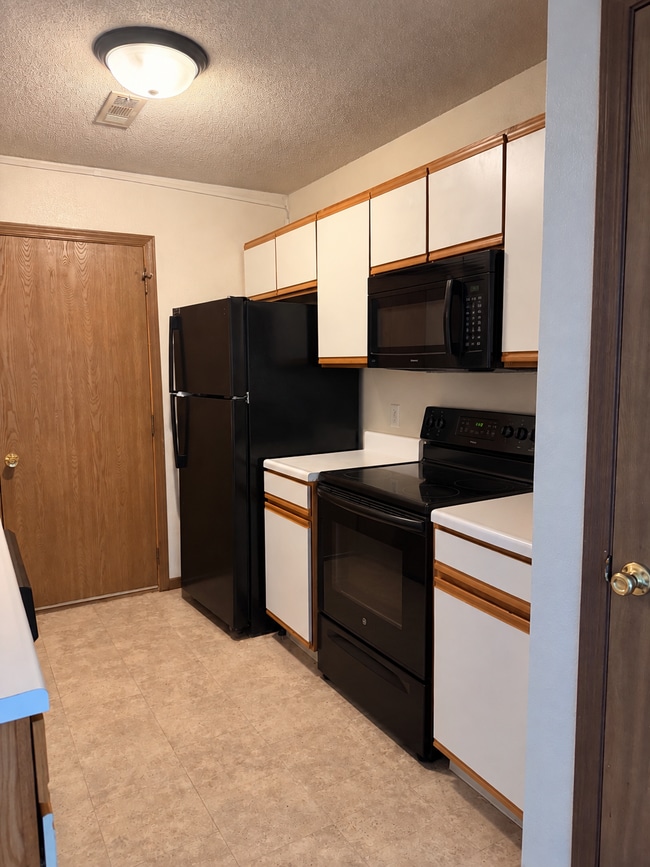 Kitchen leading to garage