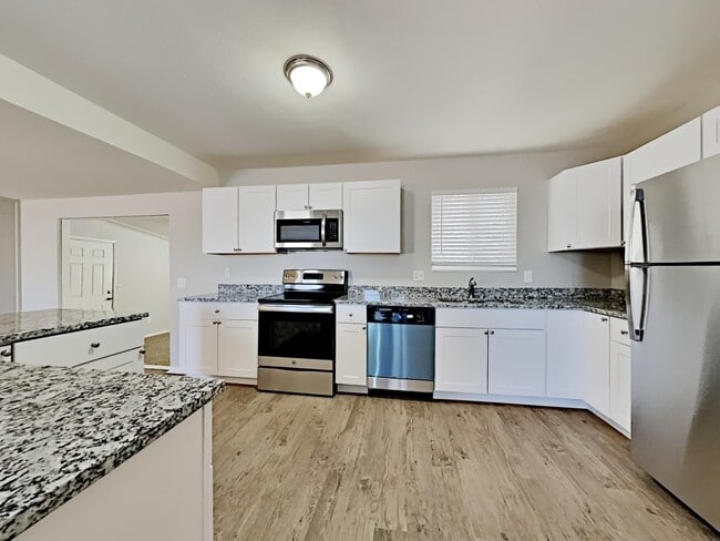 Building Photo - 4170 S Fraser Cir Unit A