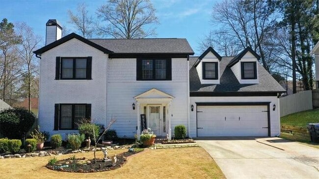 Building Photo - 4 bedroom house in Lawrenceville with cozy...