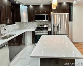 99-11 Ascan Ave