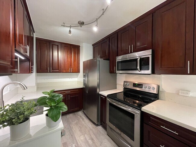 Photo - Partly Furnished 2-bedroom, 2-bath condo a... Unit 206