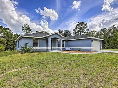 Peaceful Backyard Views! 3BR Home on Nearly Half an Acre with Screened Porch