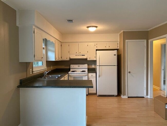 Photo - COMING SOON! 4Br, 2.5 baths, large kitchen, large bedrooms, fence, storage and more! N. College R...