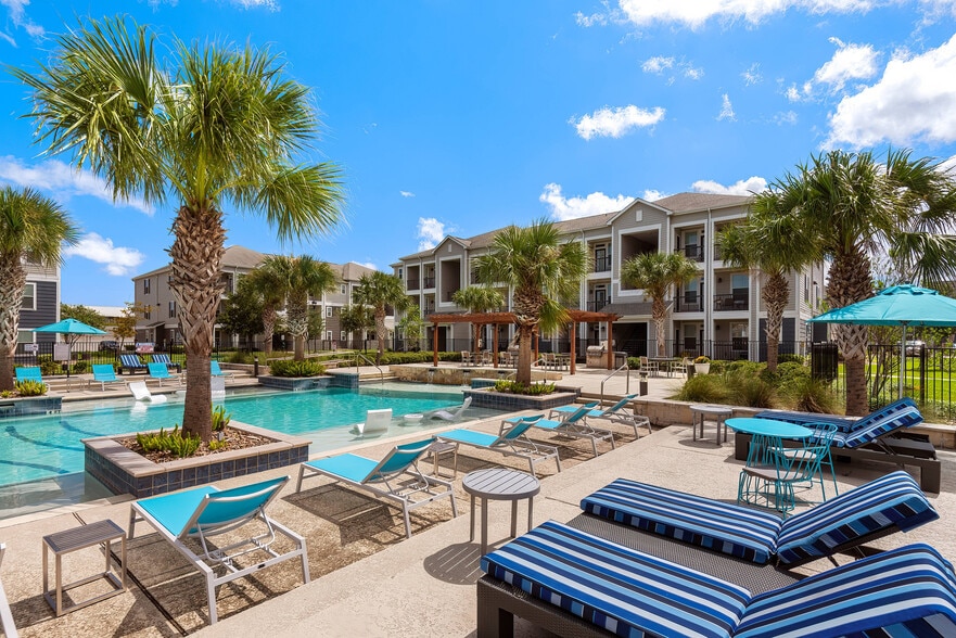 Resort-Style Swimming Pool with In-Pool Loungers at The Retreat, Corpus Christi, TX