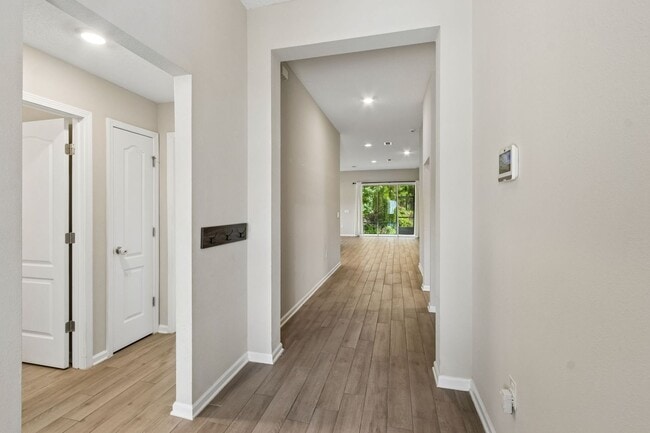 Photo - Modern 4BR Home with 3 Full Baths in River Glen | Screened Porch & Resort-Style Amenities