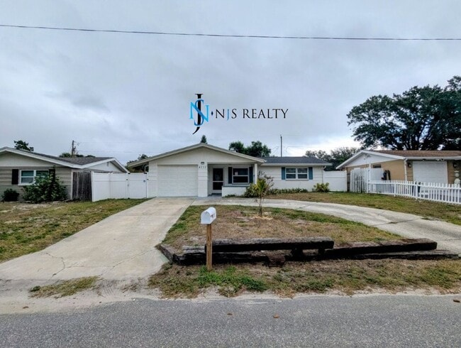 Building Photo - NEW FLOORS, NEW PAINT INSIDE & OUT.. 2/1/1...