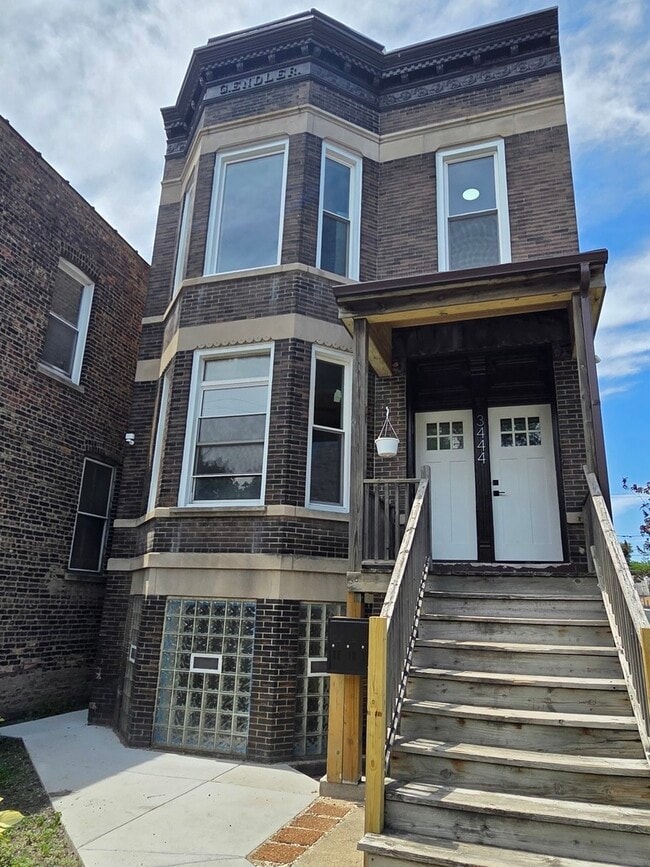 Building Photo - 3444 S Western Ave Unit 1F