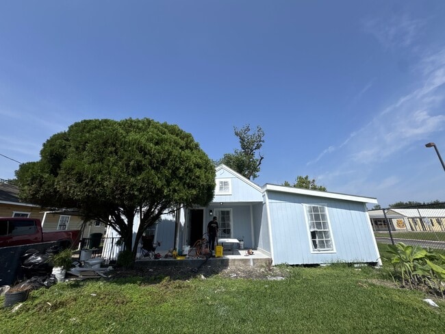 Fresh exterior paint, still in progress - 3807 Otis St