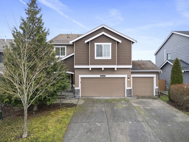 Photo - Spacious 4-Bed Puyallup Home For Rent | 3-Car Garage & Quick Commute to JBLM!