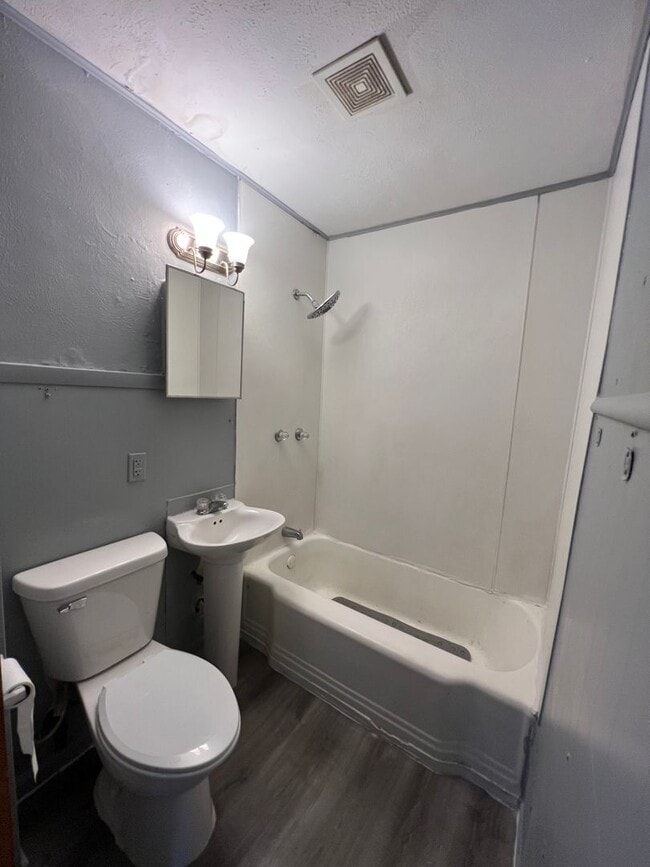 Photo - Charming 2-Bedroom, 1-Bathroom Home – $950...