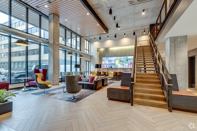 Open Interactive Lobby Lounge - HQ Apartments