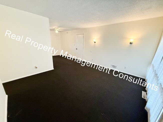 Photo - Charming 3-Bed Home with Fenced Yard & Garage