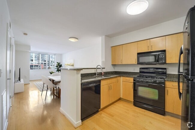 Building Photo - Spacious 1BR + Parking and Building Amenit... Rental