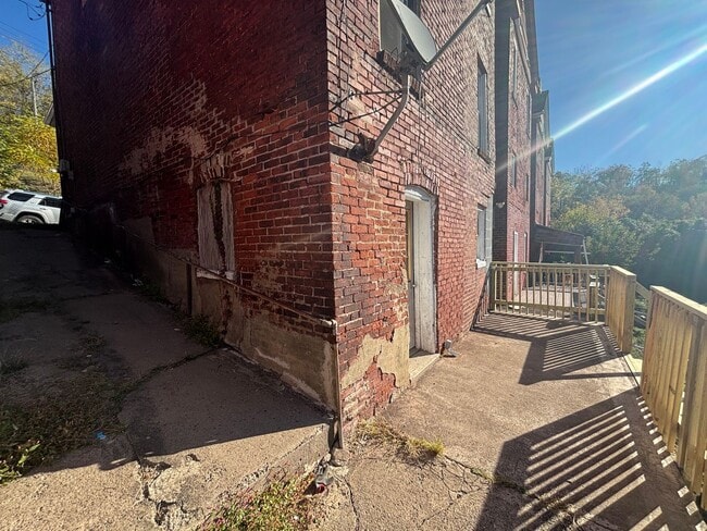 Photo - Updated flooring, finished basement, and g...