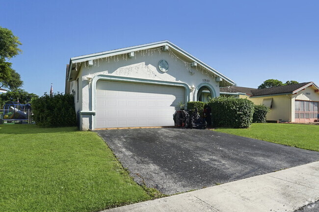 Building Photo - 10849 NW 23rd Ct Rental