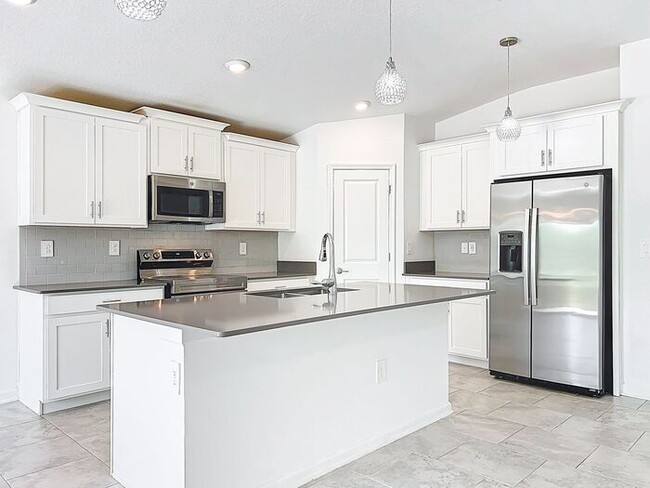 Photo - 4/2 Groveland Home with Solar Panels-MOVE IN SPECAIL: $200 OFF FIRST MONTH'S RENT