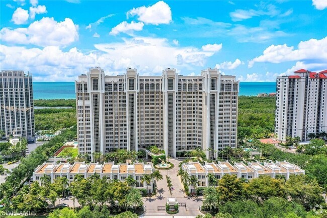 Building Photo - 7117 Pelican Bay Blvd Unit 1506 Rental