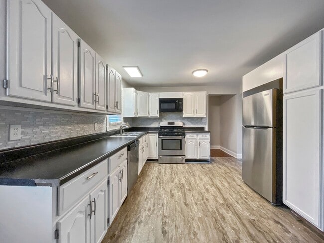 Photo - Stunning 4-Bed, 2.5-Bath Corner Lot Home with Modern Upgrades & Detached Garage – Move-In Ready!