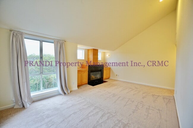 Photo - Wood burning fireplace in this updated 2 b... Unit Apt 2