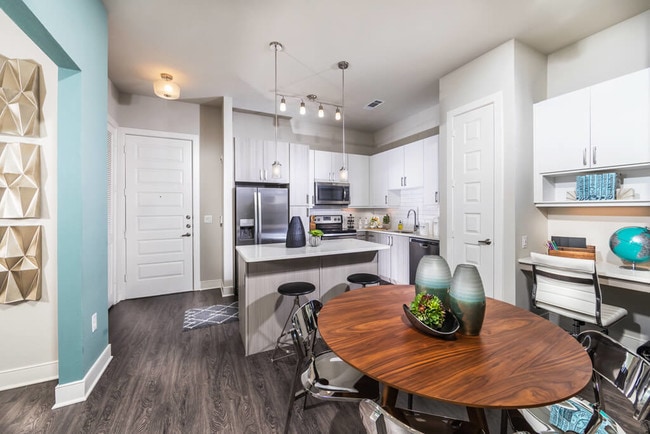 2 bedroom living space with built-in desk