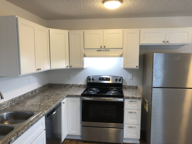 This modern kitchen features sleek stainless steel appliances