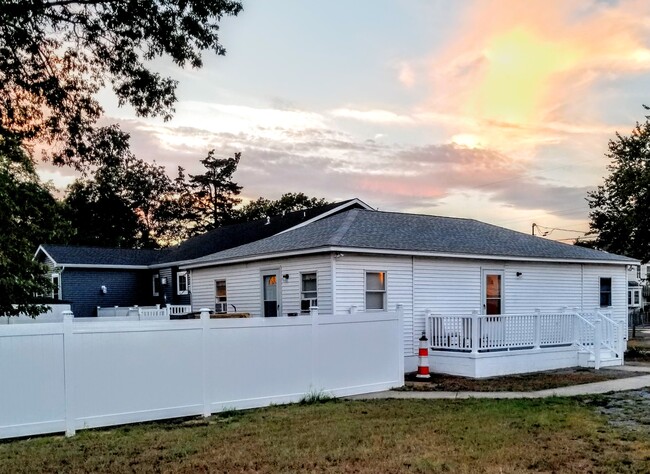 outside sunset view - 802 New Rd House