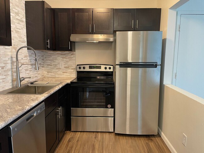 Photo - Bright 2-Bedroom Apartment with Private De... Unit 5723 East G Ave.  7
