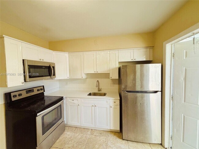 Photo - 825 NE 7th St Unit rear