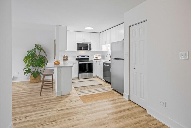 Photo - Modern 2 Bedroom Apartments | Recently Renovated | Pet Friendly | Prime Location Unit 220