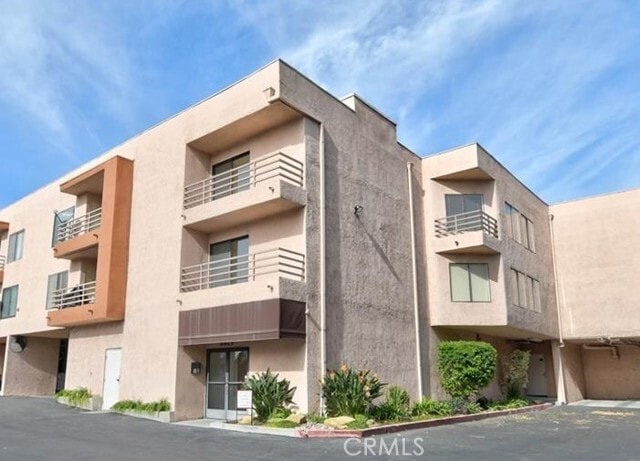 Building Photo - 6815 Remmet Ave Unit 222