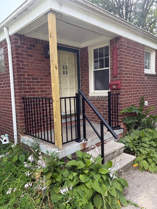 Photo - Cute and Cozy freshly painted 2 bedroom, 1 bath brick ranch on a double fenced in lot