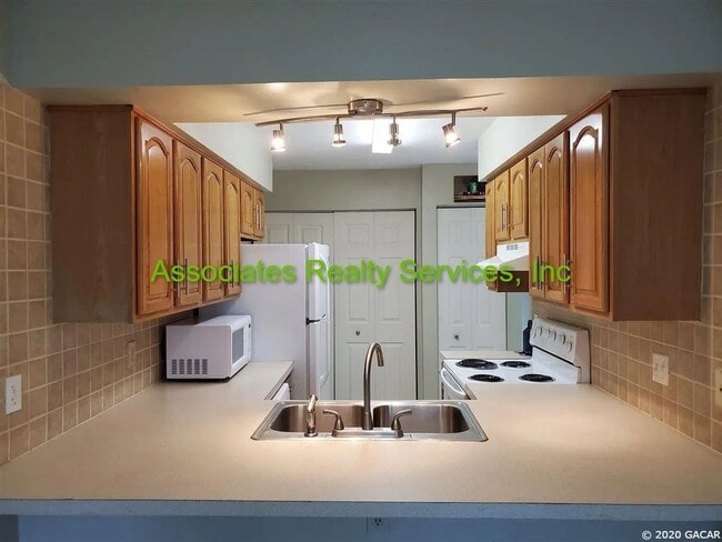 Building Photo - 2bed/1.5bath Condo in SW Gainesville minutes from UF, Shands & More!