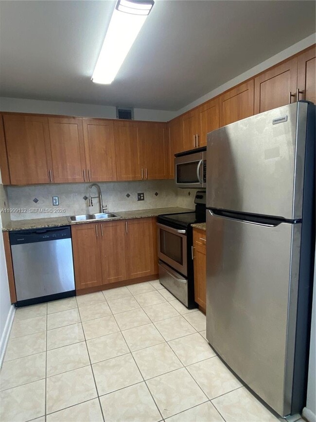 Building Photo - 13255 SW 9th Ct Unit 202G