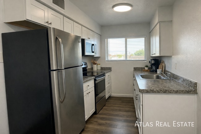 Building Photo - 1045 E University Dr Unit 203