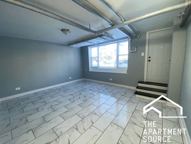 Photo - 5664 N Ridge Ave Unit BASEMENT