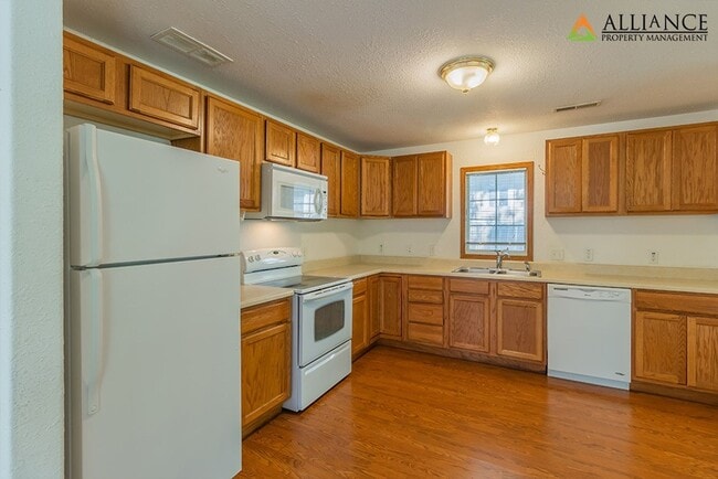 Photo - All appliances included, washer/dryer hookups!