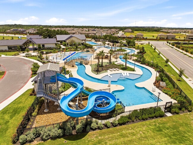 Photo - RESORT STYLE AMENITIES!! Multiple Pools. Lazy River. Splash Pad and Water Slides. Fitness Center....