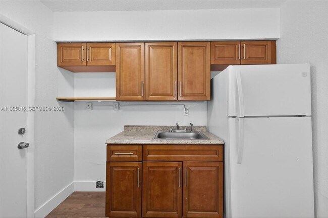 Building Photo - 7155 W 14th Ct Unit 1