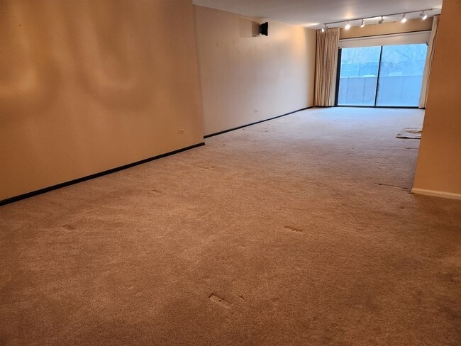 Photo - 9242 Gross Point Rd Unit 107