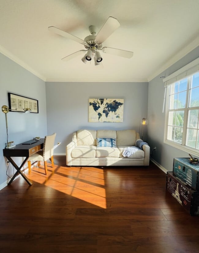 Living room and desk space - 501 Knights Run Ave Condo Unit Harbour Island