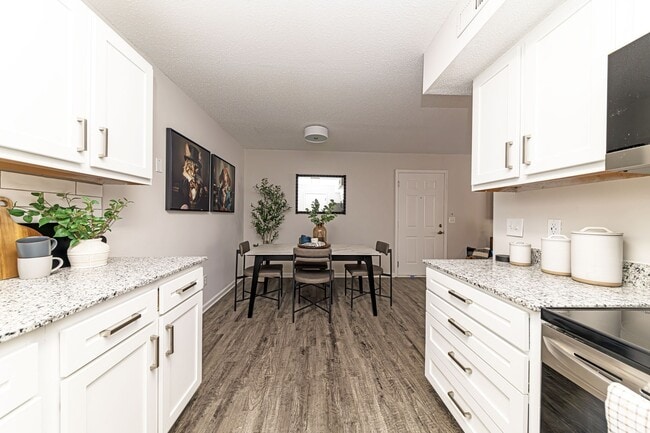 Kitchen with granite counters and modern cabinetry