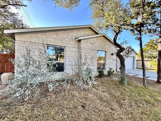 Photo - Charming 4/BR 2/BA Home with 2-Car Garage and Private Fenced Backyard