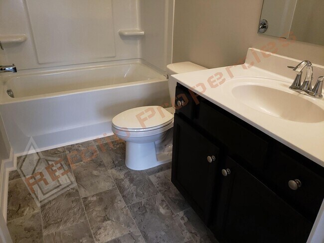 Photo - Beautiful Luxury 3 Story 3 Bedroom Townhome with 1st Floor Guest Suite, Attached 2 Car Garage, Co...